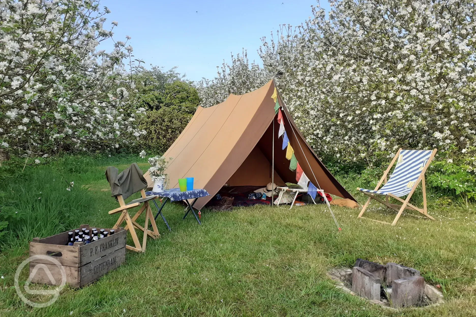 Non-electric grass pitch with fire pit 