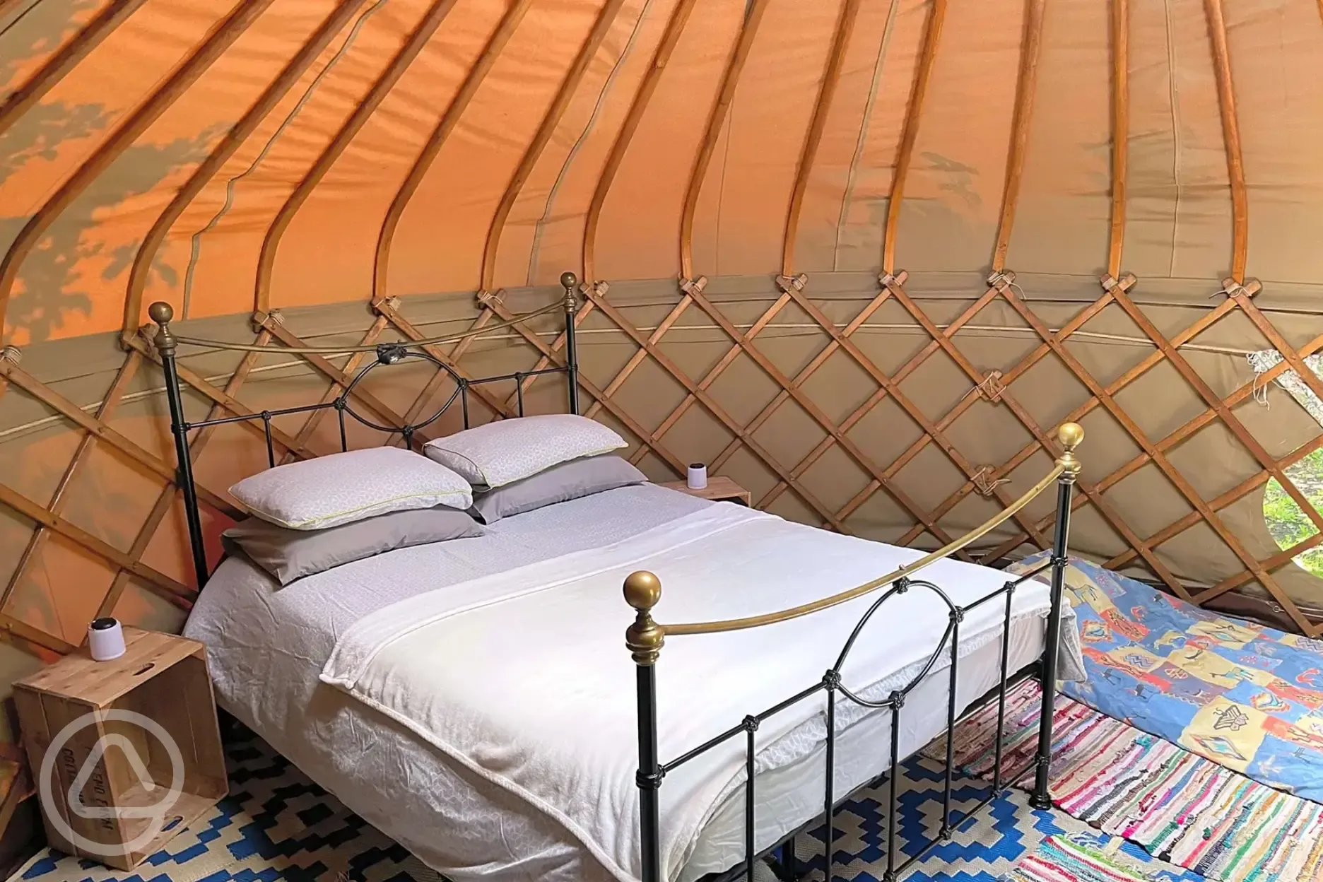 Yurt interior with a king size bed