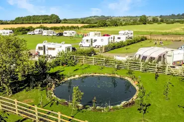 The pitches and onsite pond at Westgate Carr Farm
