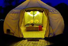 Lit bell tent at night