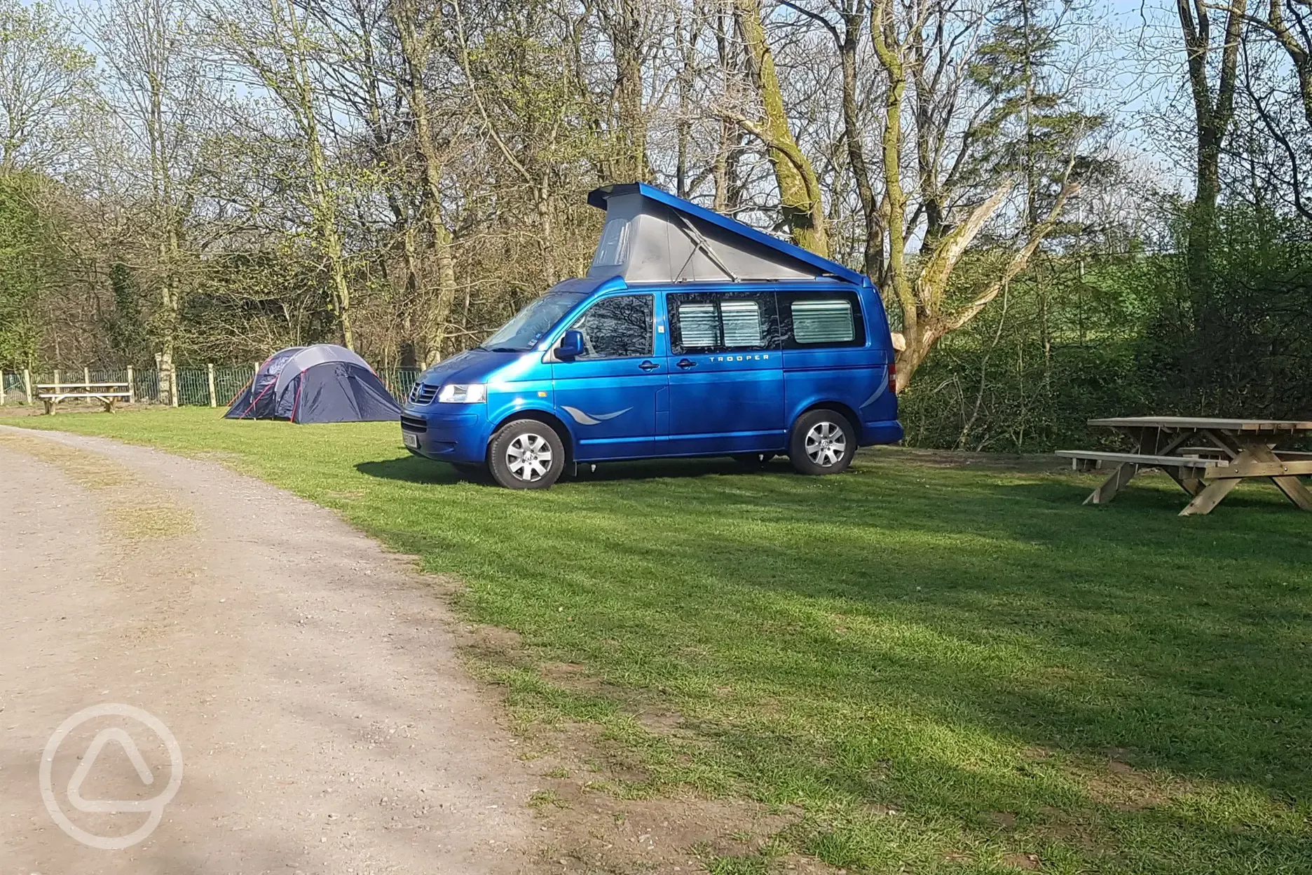 Camper on the grass in April