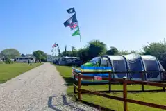 Electric grass pitches with 10 amp hook ups (9m x 9m)