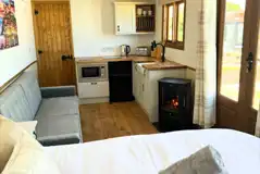 Shepherd's hut with a microwave, kettle, toaster and fridge/freezer