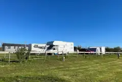 Electric grass pitches with 10 amp hook ups (9m x 9m)