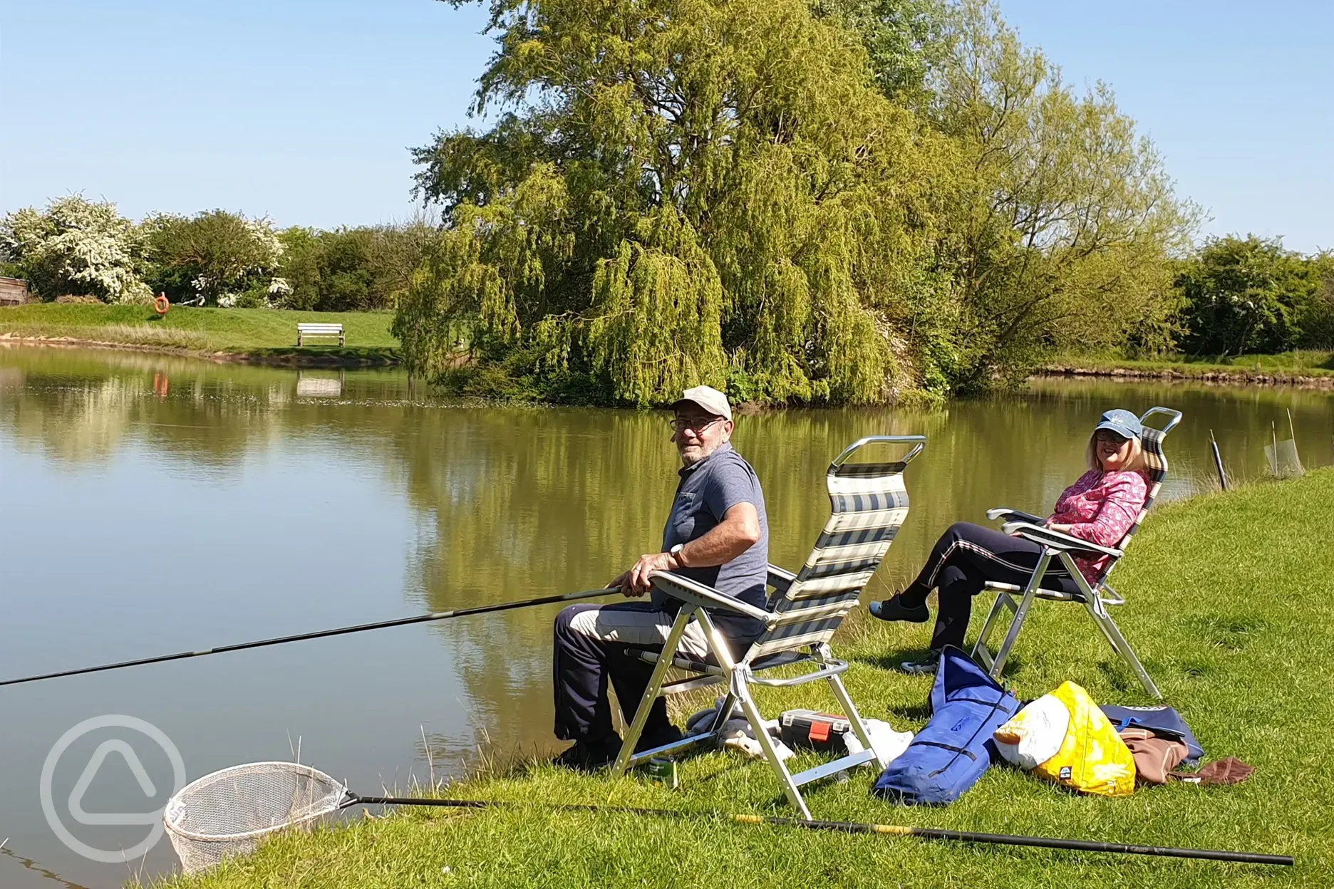 lakeside fishing couple