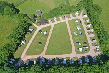 Oakmoor Touring Park Aerial of grass and hardstanding pitches