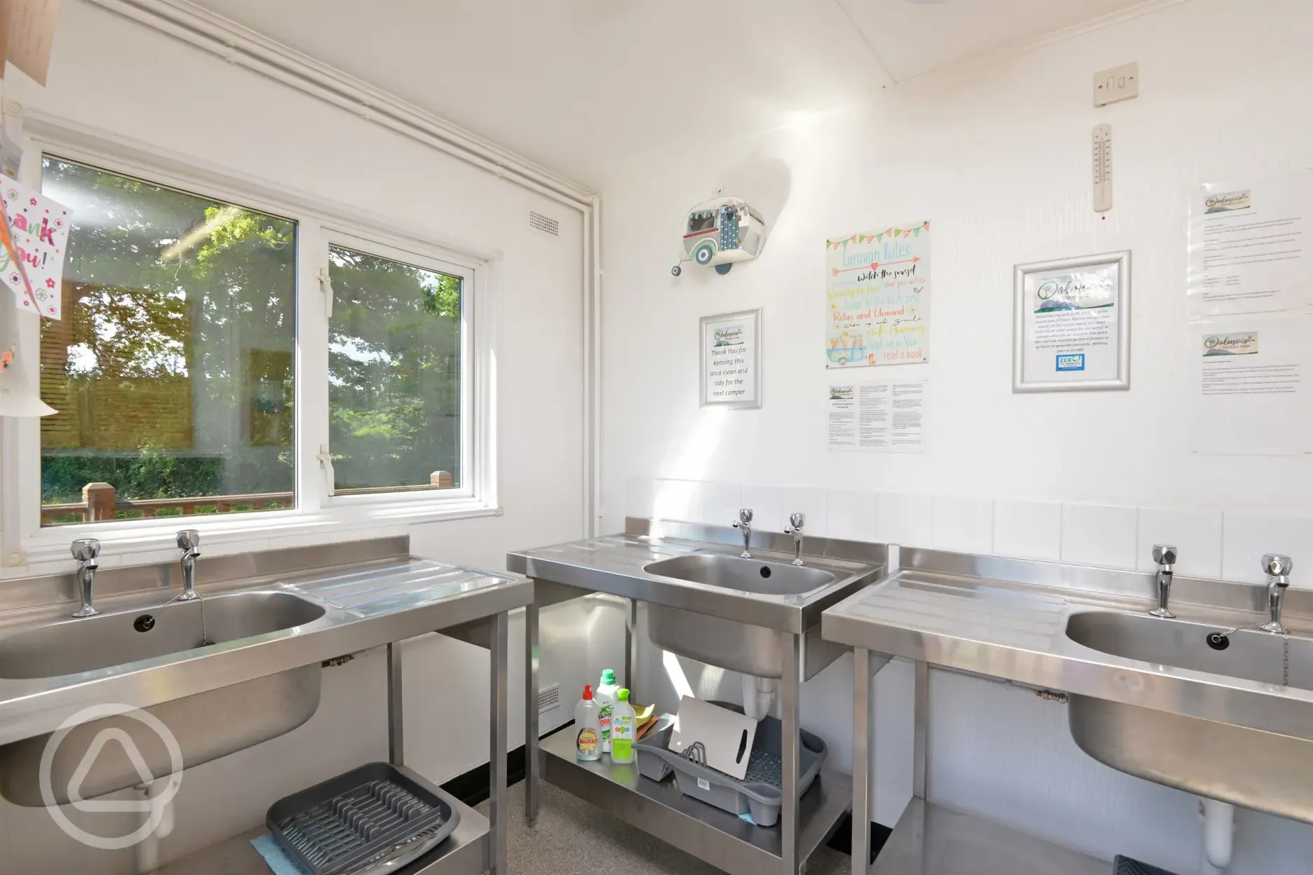 Washing up area with washing essentials provided at Oakmoor Touring Park