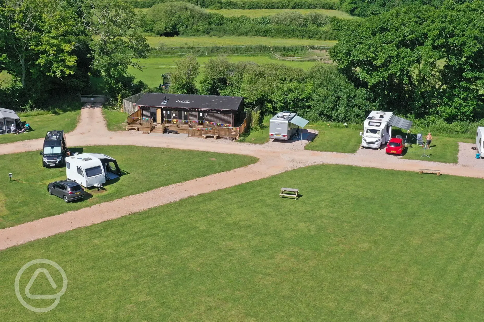 Electric and non electric grass pitches at Oakmoor Touring Park