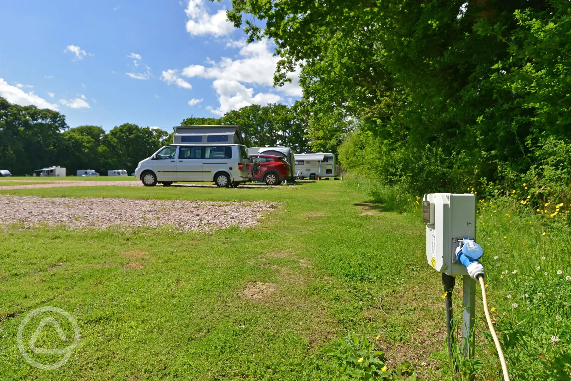 Hardstanding electric gravel pitches at Oakmoor Touring Park