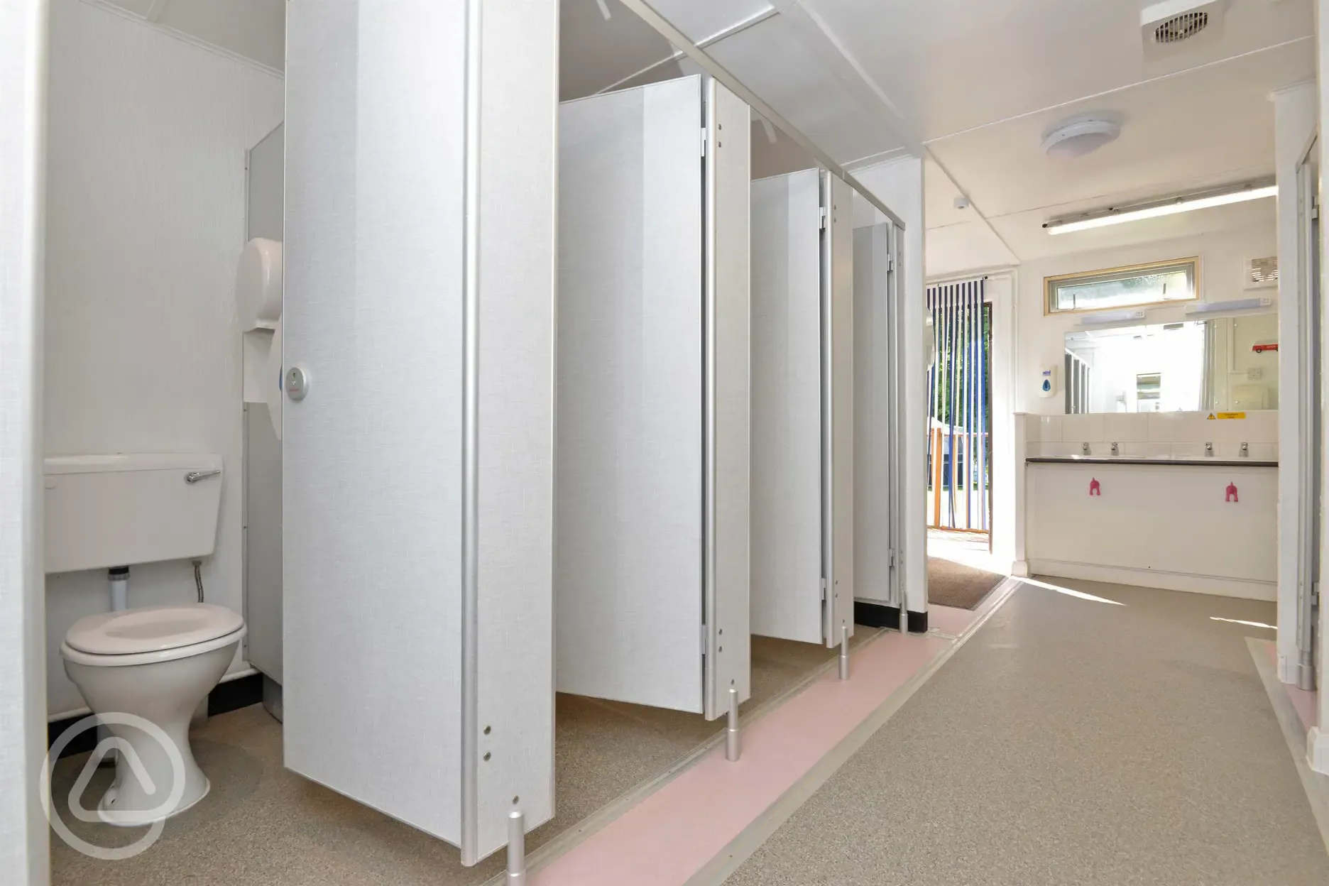 Toilet cubicles at Oakmoor Touring Park