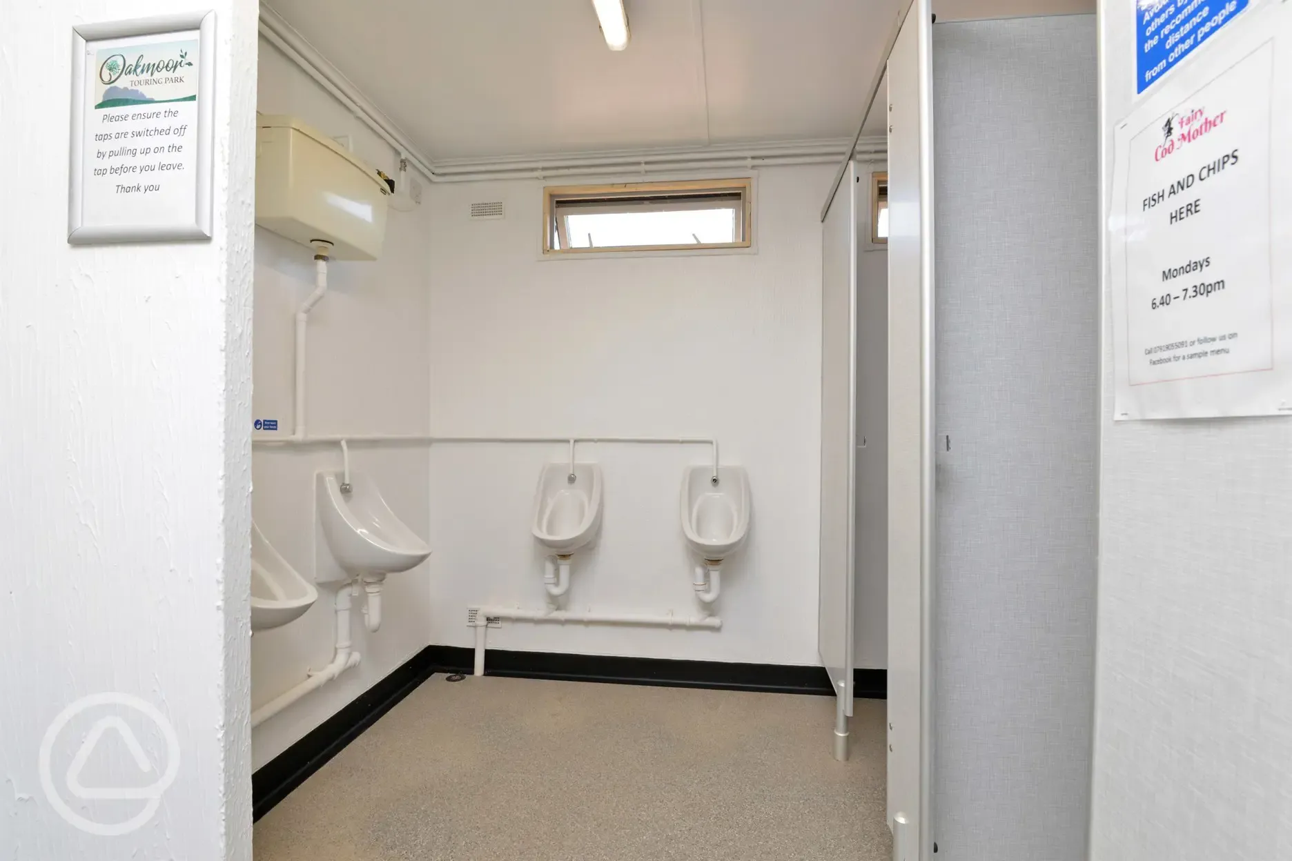Male toilets and urinals at Oakmoor Touring Park 