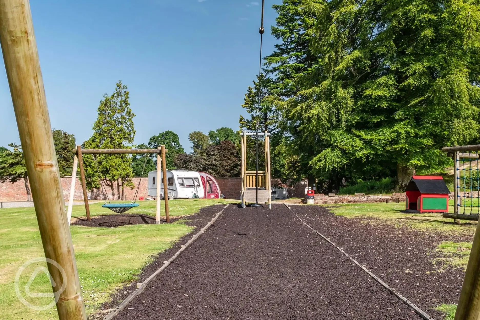 Children's play area with a zip wire