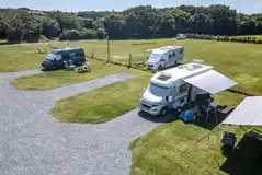 Hardstanding pitches with grass areas between