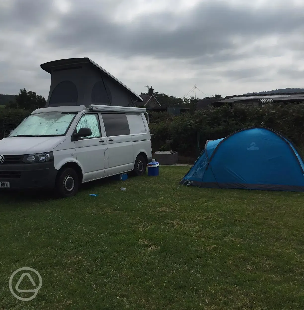 Campervan and tent grass pitch