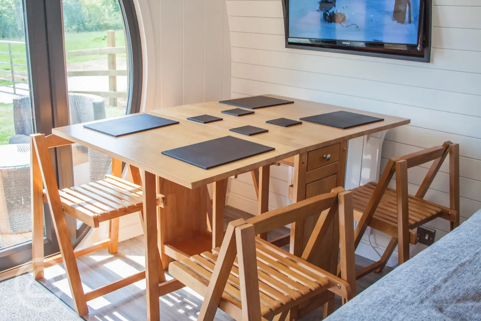 Family glamping pod dining area