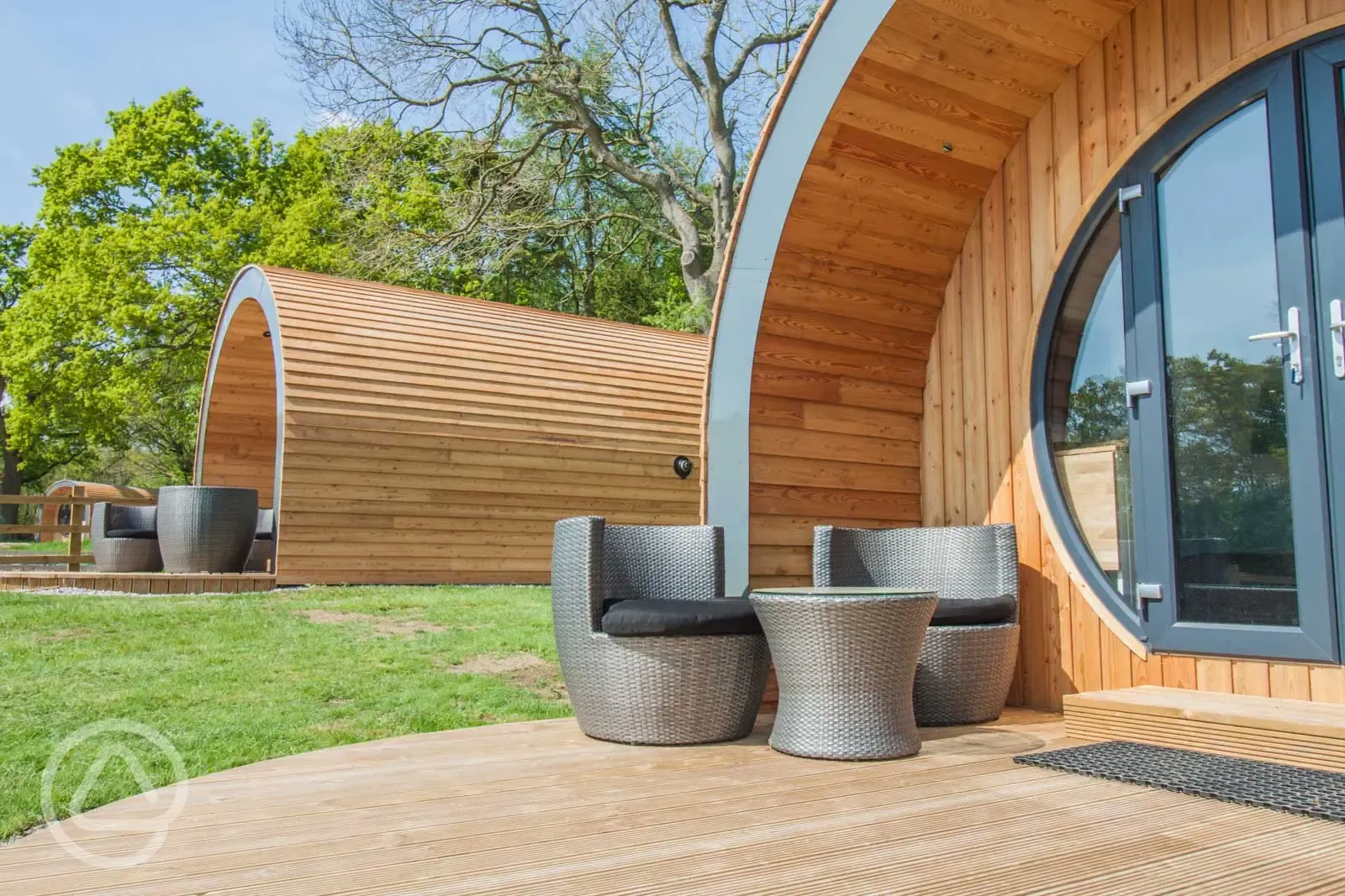 Glamping pods and outdoor seating