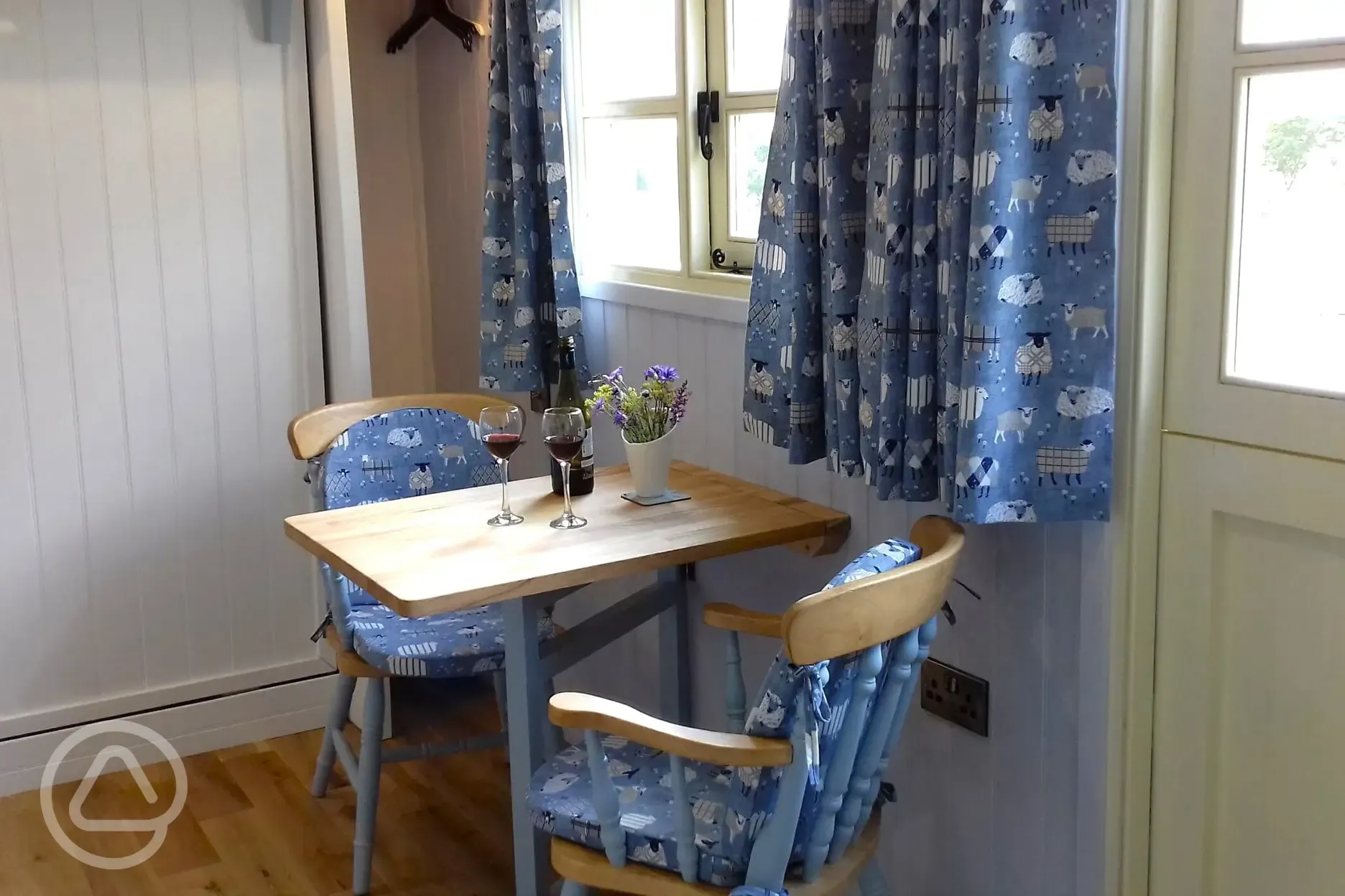 Shepherd's hut dining area