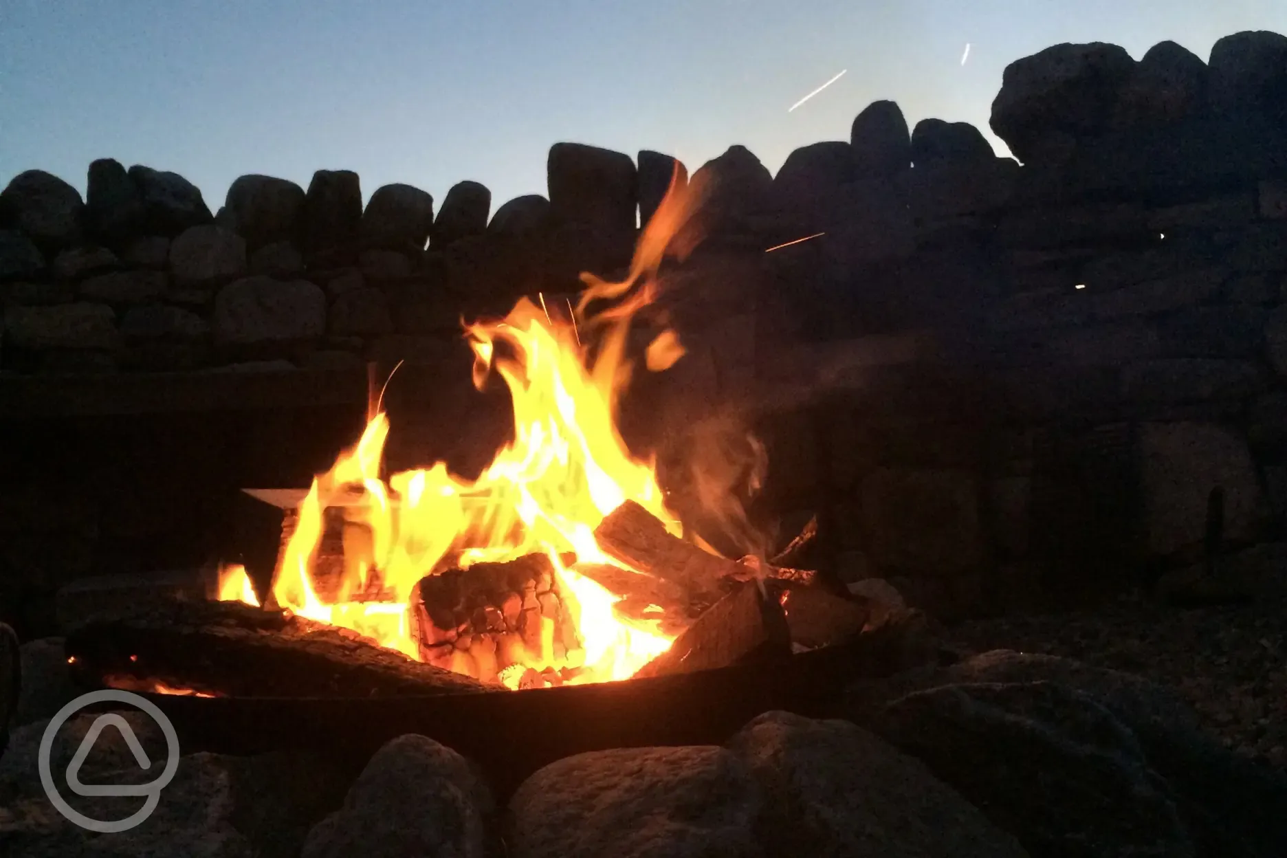 Camp Fire in the Fire Pit at Mangersta Croft Holidays in Uig