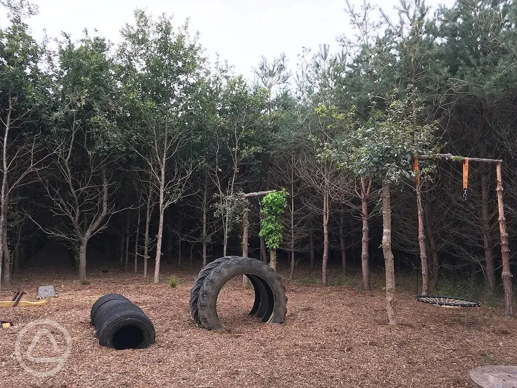 Play area at Old Farm Camp and Touring Site