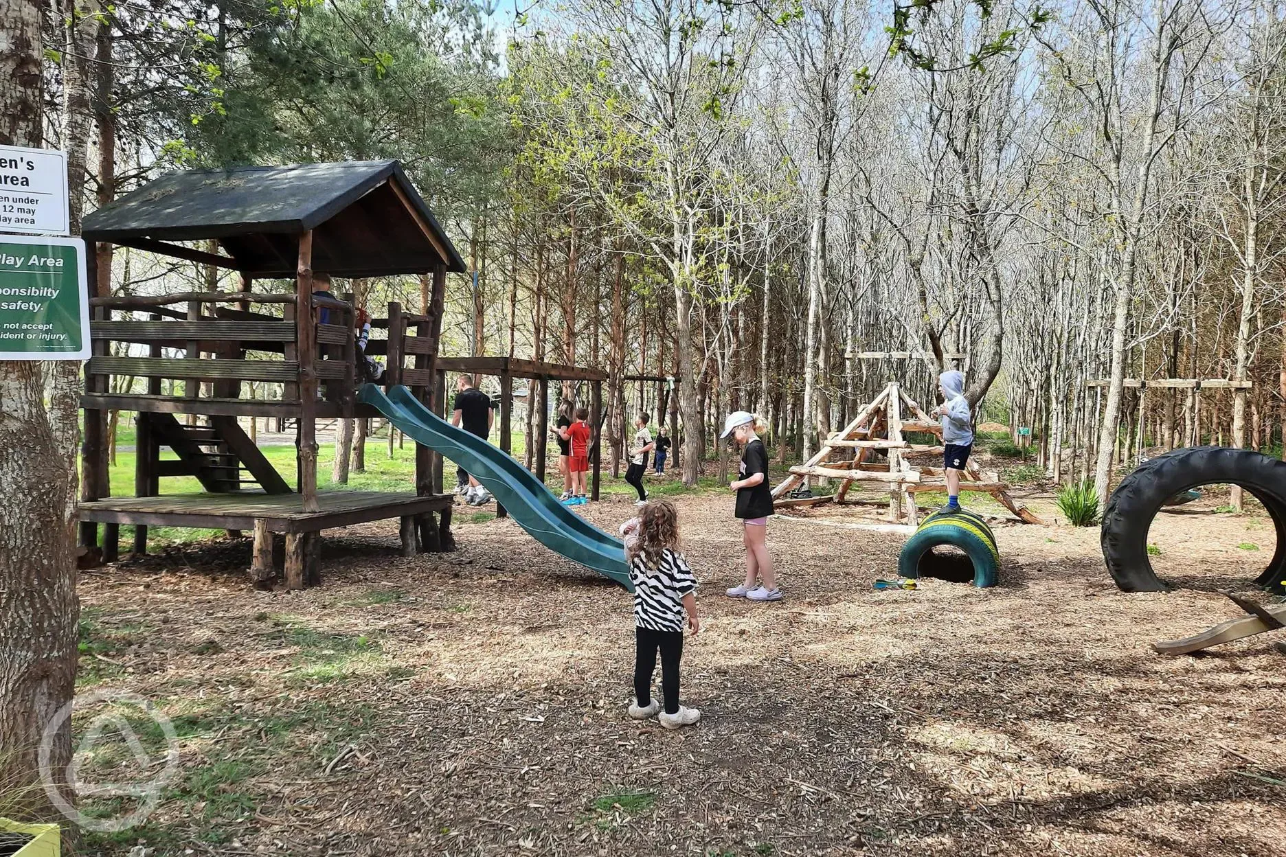 Play area at Old Farm Camp and Touring Site