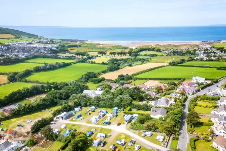 Aerial of campsite by the beach