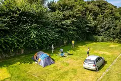 Grass pitches with an optional electric 16 amp hook up