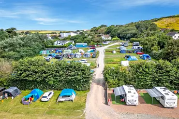 Aerial of the grass and hardstanding pitches at Camping @ Croyde Bay