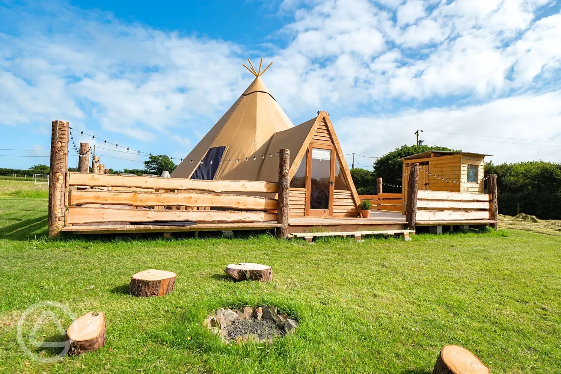 Piran Kata tipi with an outdoor fire pit area