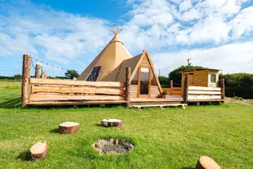 Piran Kata tipi with an outdoor fire pit area