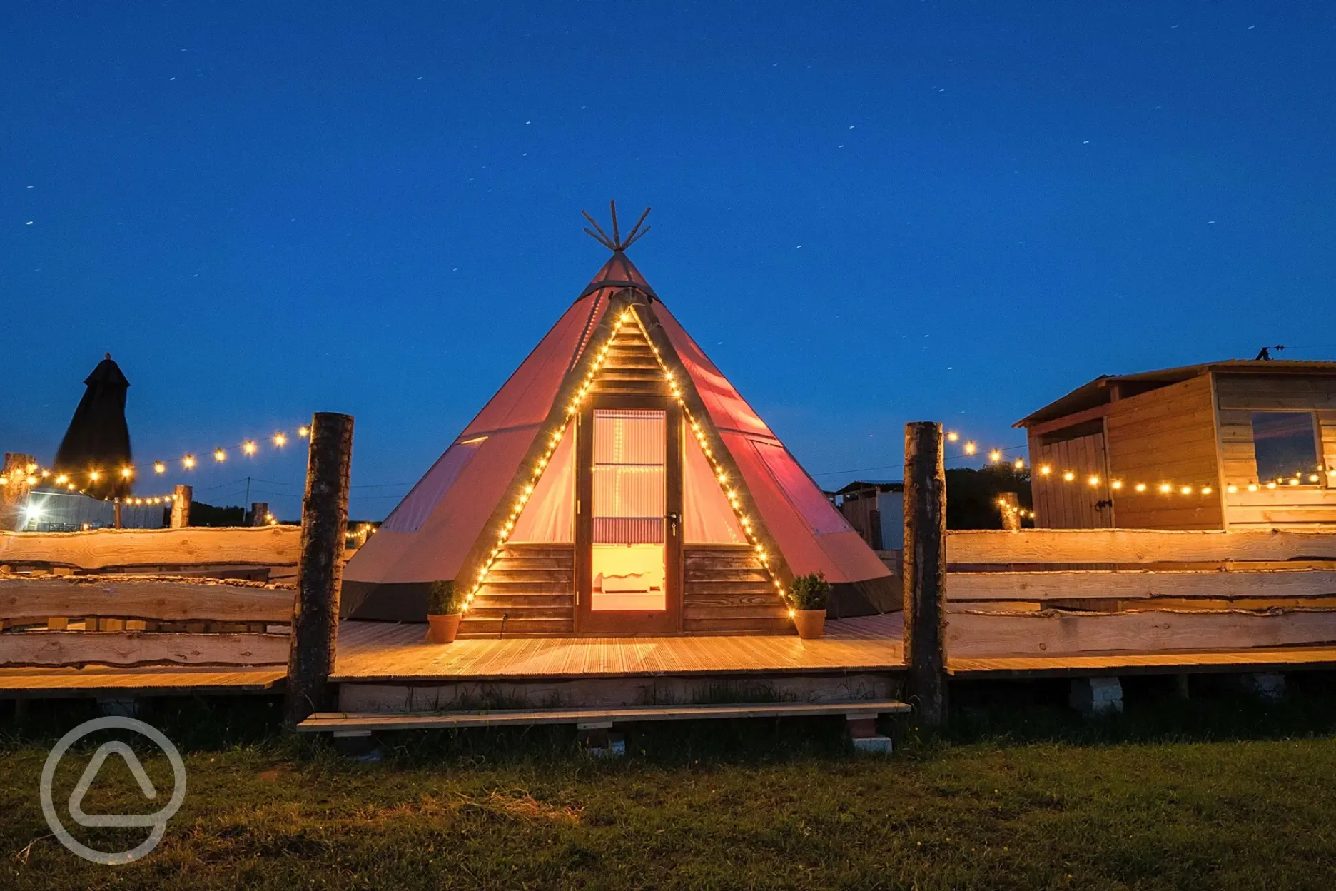 Piran Kata tipi lit up at night