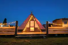 Piran Kata tipi lit up at night
