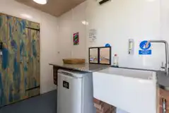 Washing up sink and shared fridge