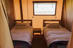 Safari tent twin bedroom