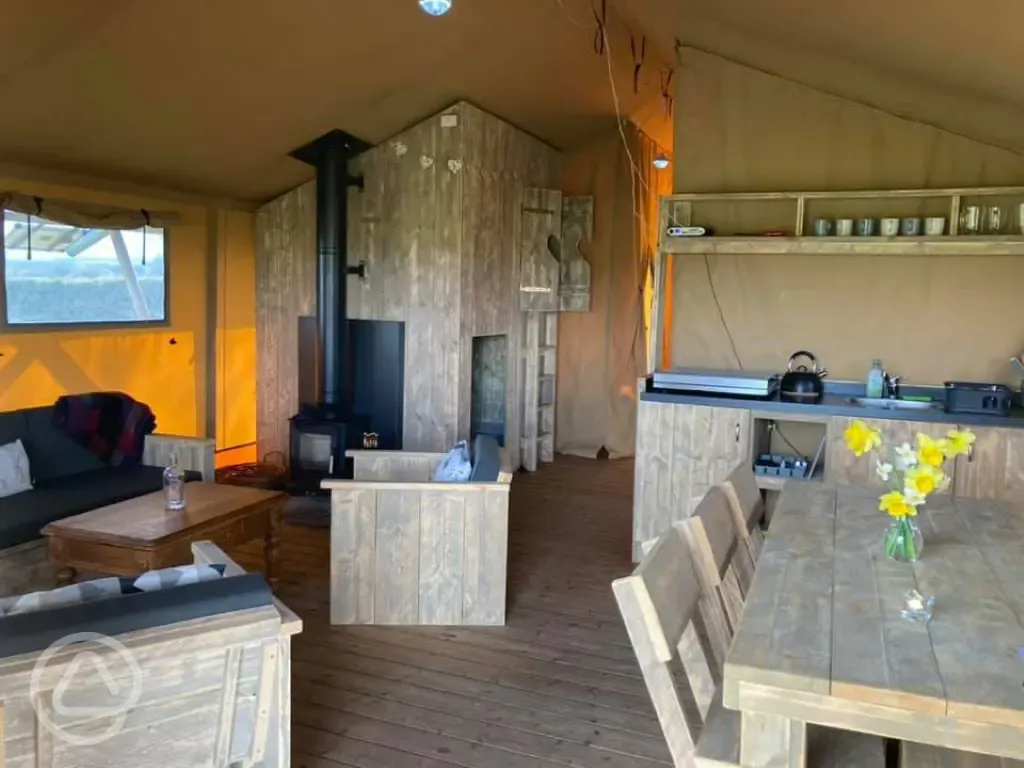 Safari tent kitchen and dining area