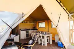 Safari tent kitchen and dining area