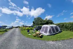 Grass tent pitches (optional electric)