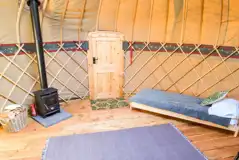 Yurt interior with two single beds