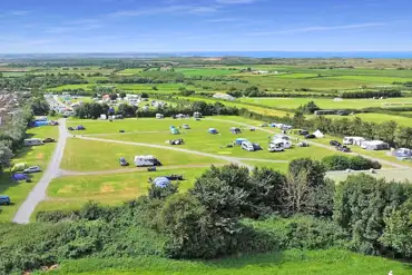 Aerial of the site and views to Saunton Sands