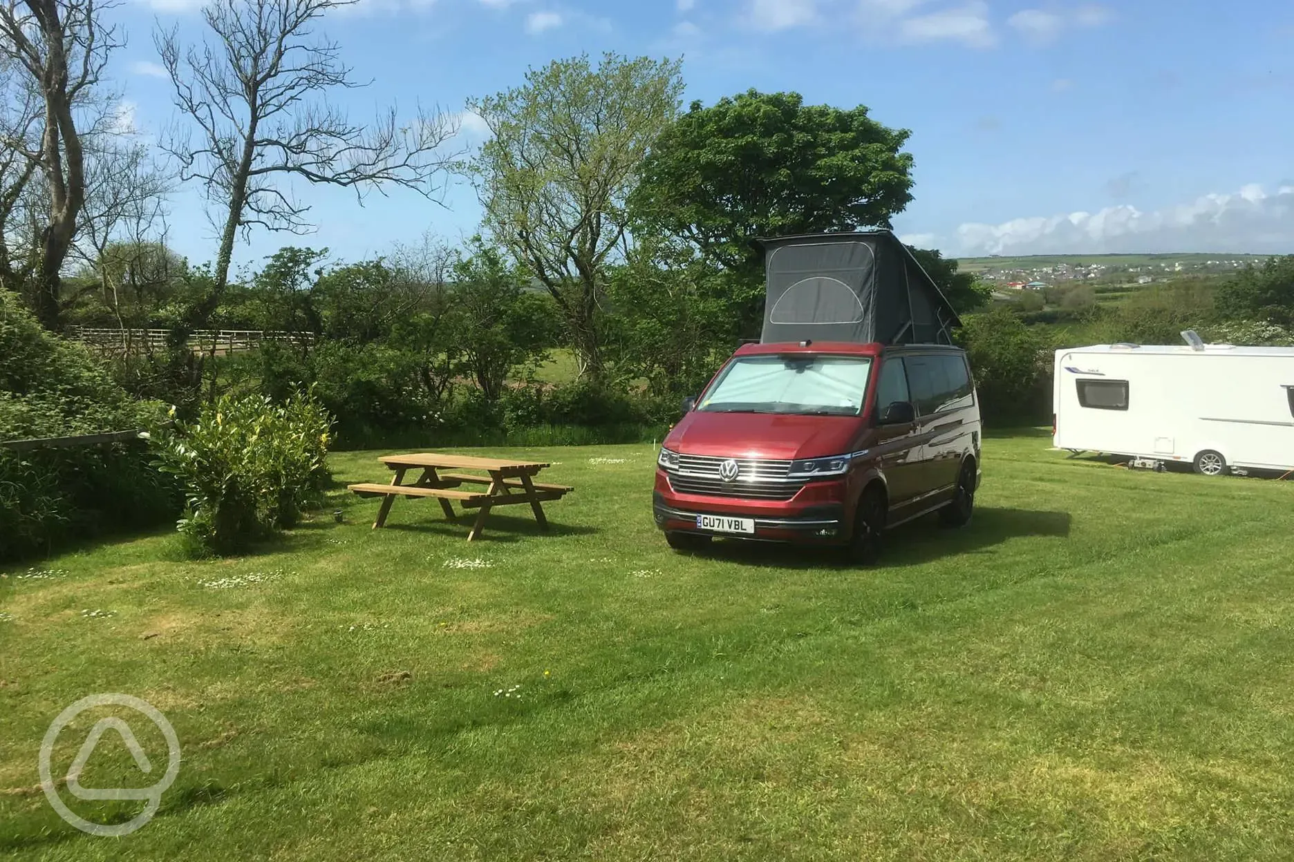 Grass pitches with optional electric (Panoramic)