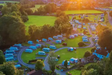 Aerial view of Erwlon Caravan and Camping Park, surrounded by countryside