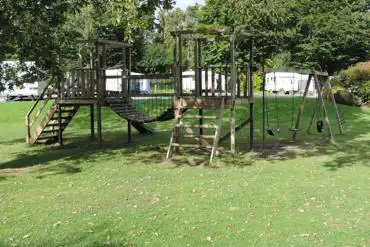 Climbing frame with swings