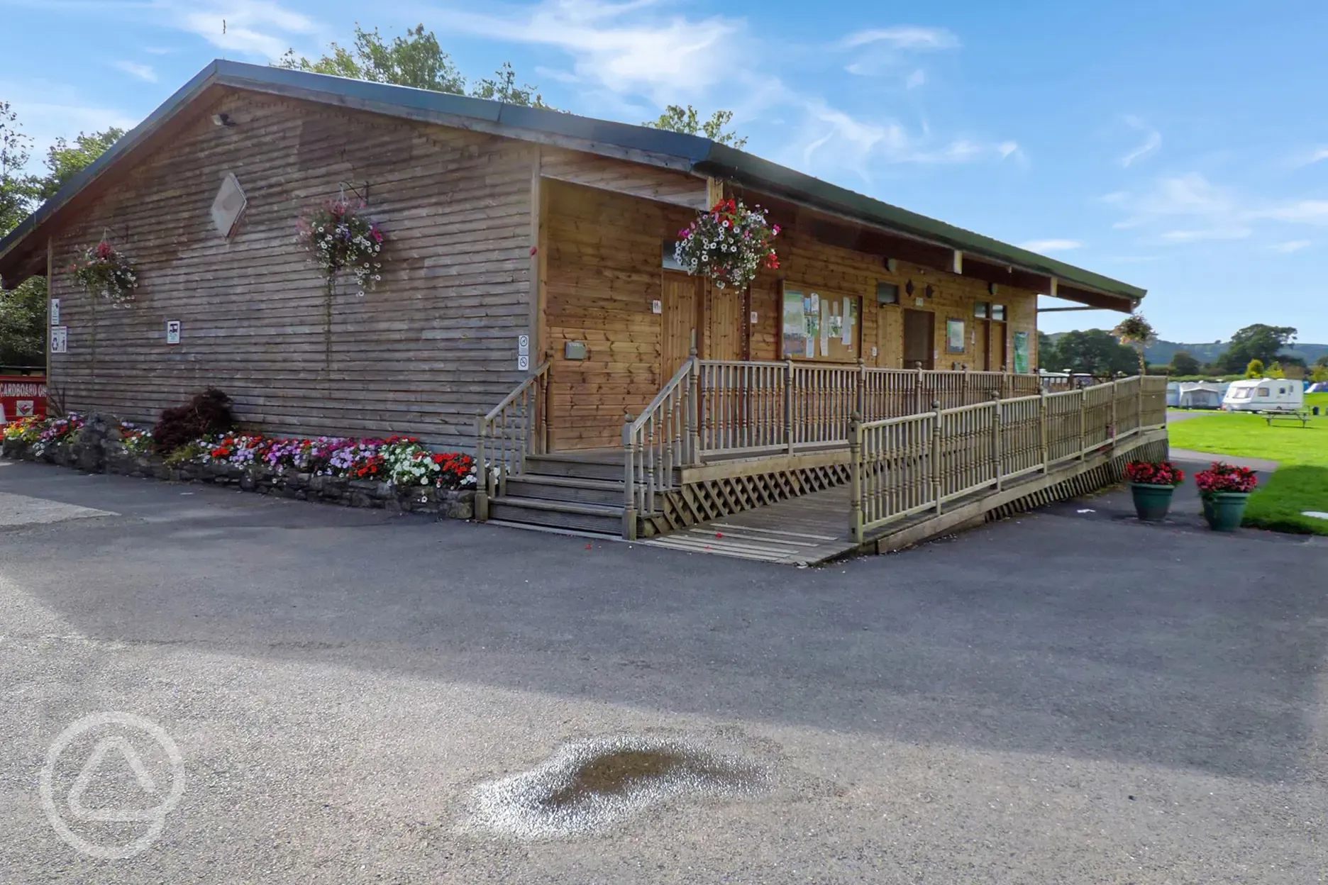 Facilities building with toilets, showers, laundry and family rooms