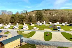 Electric hardstanding pitches next to kids playground Electric hardstanding pitches next to kids playground