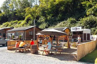 Bar and café featuring a sheltered outdoor seating area