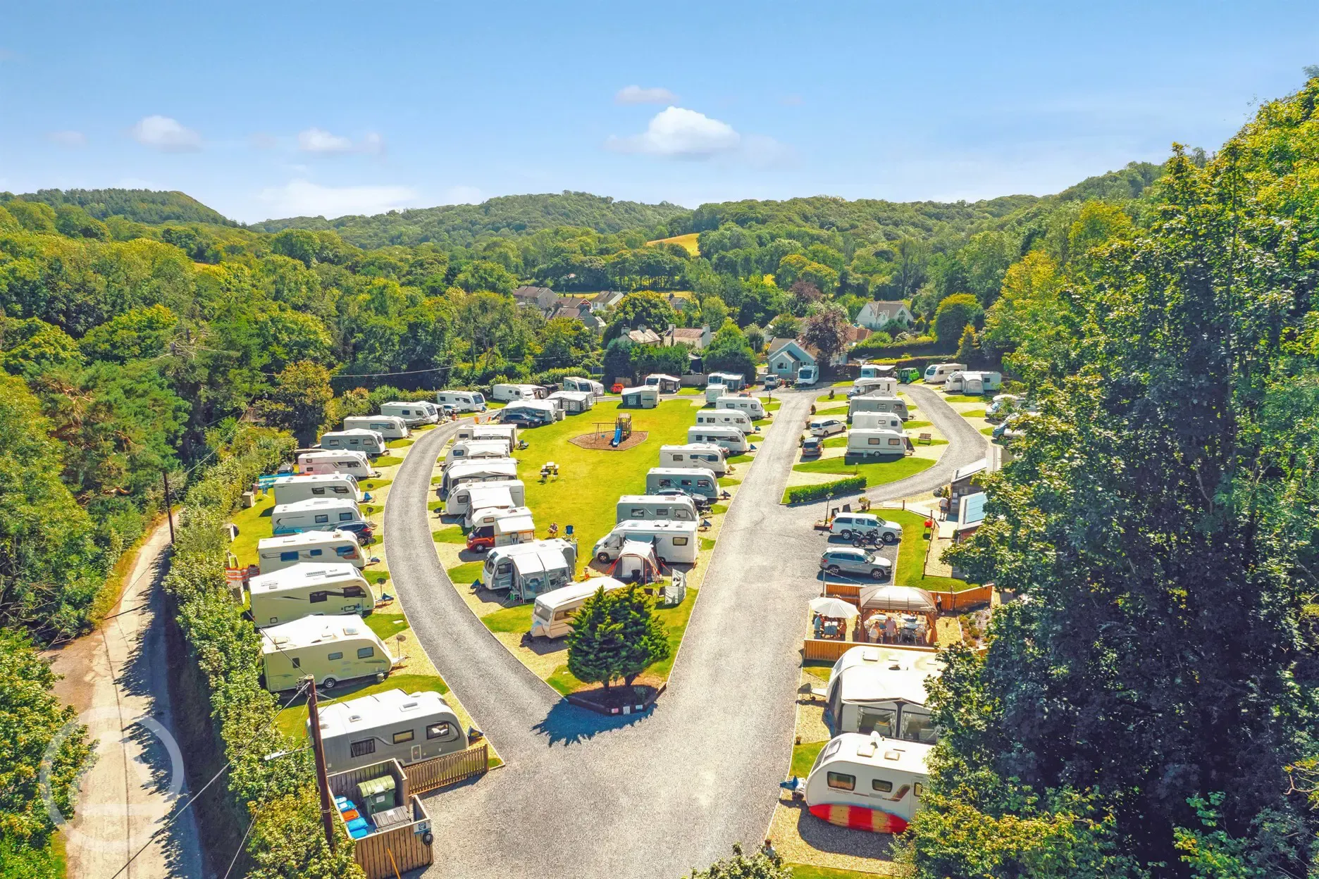 Aerial of Wern Mill inland, surrounded by trees