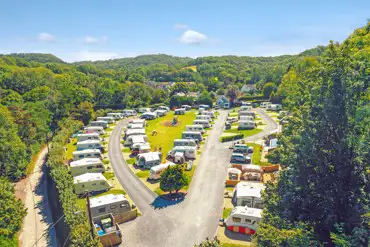 Aerial of Wern Mill inland, surrounded by trees