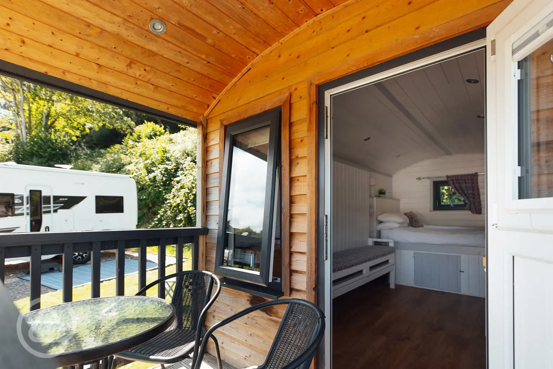Seating area outside of shepherd's hut