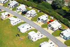 Tourers with awnings on the electric hardstanding pitches Tourers with awnings on the electric hardstanding pitches
