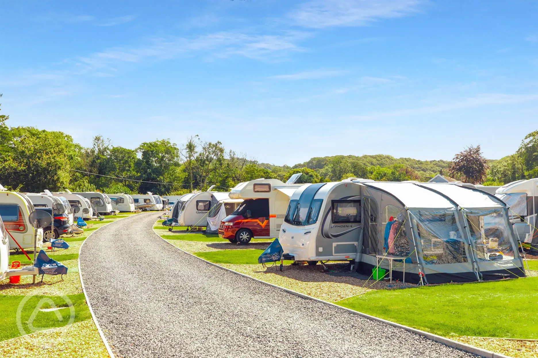 Tourers on electric hardstanding pitches at Wern Mill