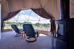 Geodome interior with two leather recliners Geodome interior with two leather recliners